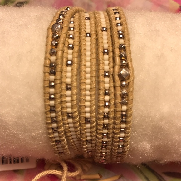 SILVER BEAD WRAP ON LIGHT BEIGE LEATHER - Picture 1 of 4