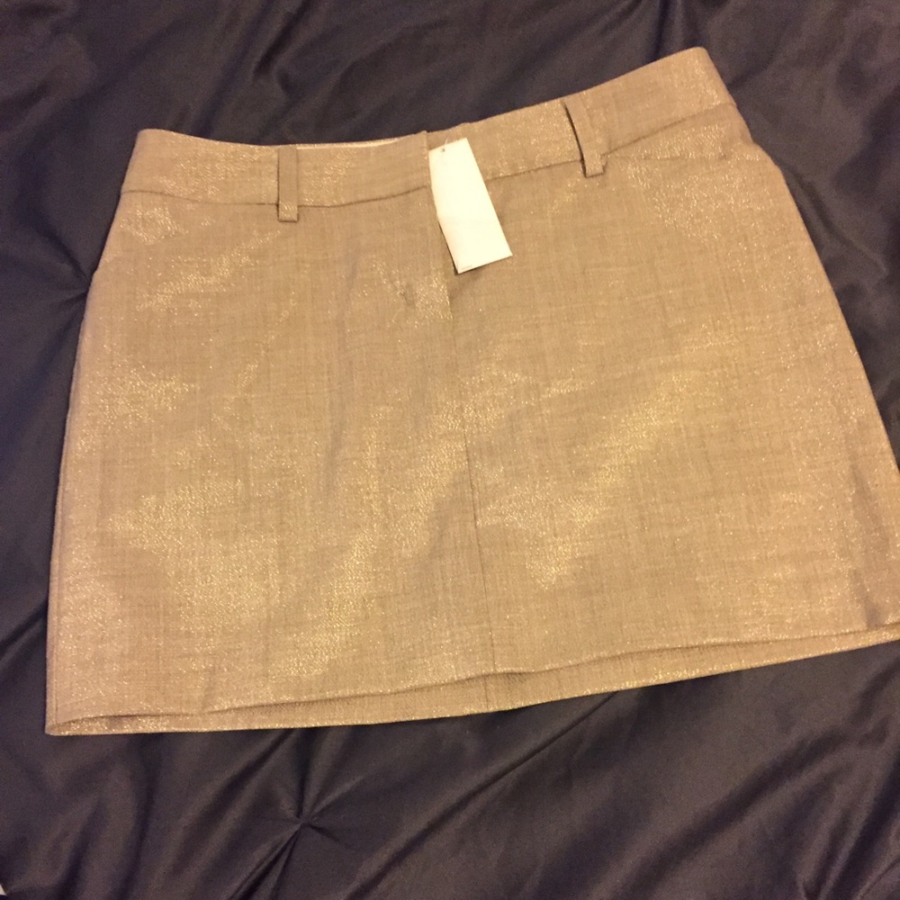 Gold miniskirt!
