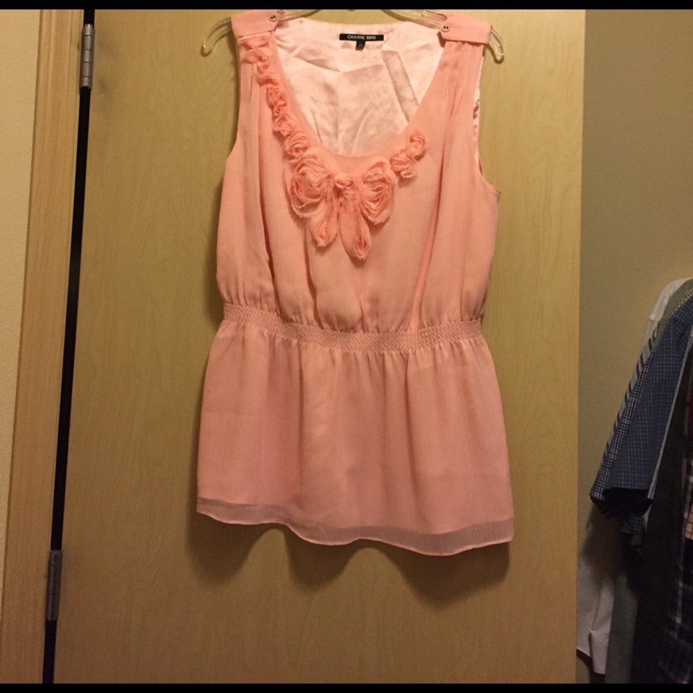 Beautiful top peach color perfect for spring