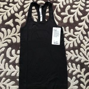 Lululemon Swiftly Tech Racerback sz 4. Brand new.