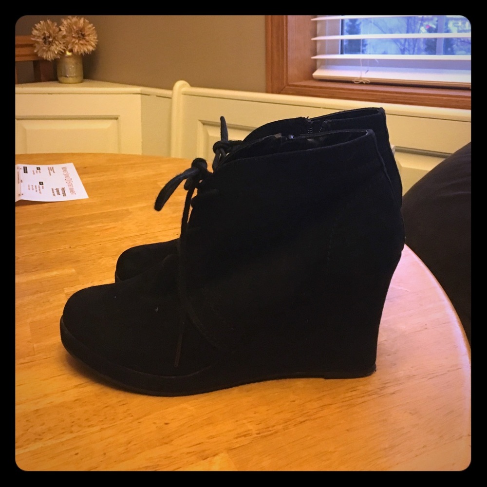 Black wedge booties