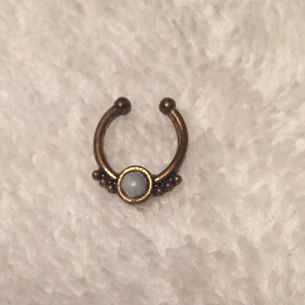 Fake septum ring clicker