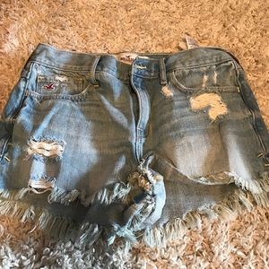 light blue ripped shorts