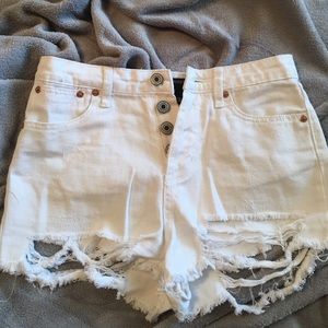 White distressed jean shorts
