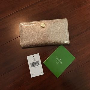 Authentic Kate Spade rose gold wallet
