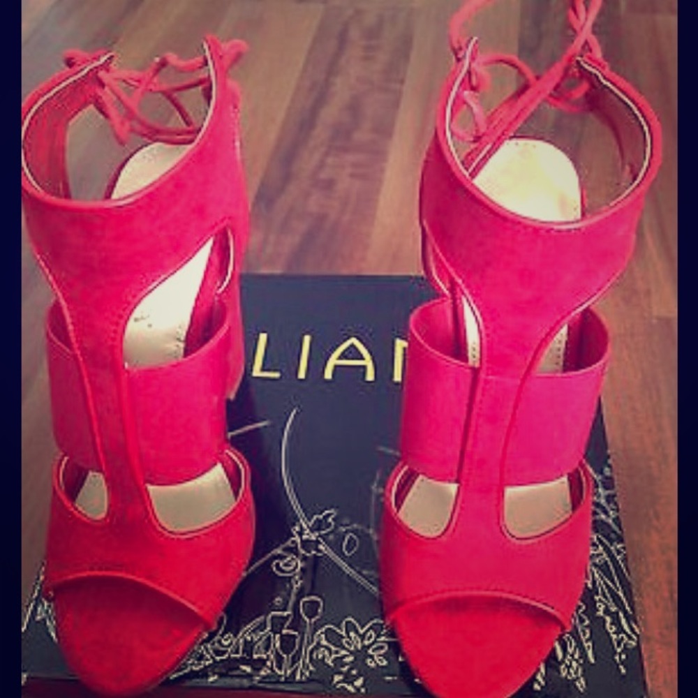 Size 6.5 liliana red lace-up back heel.