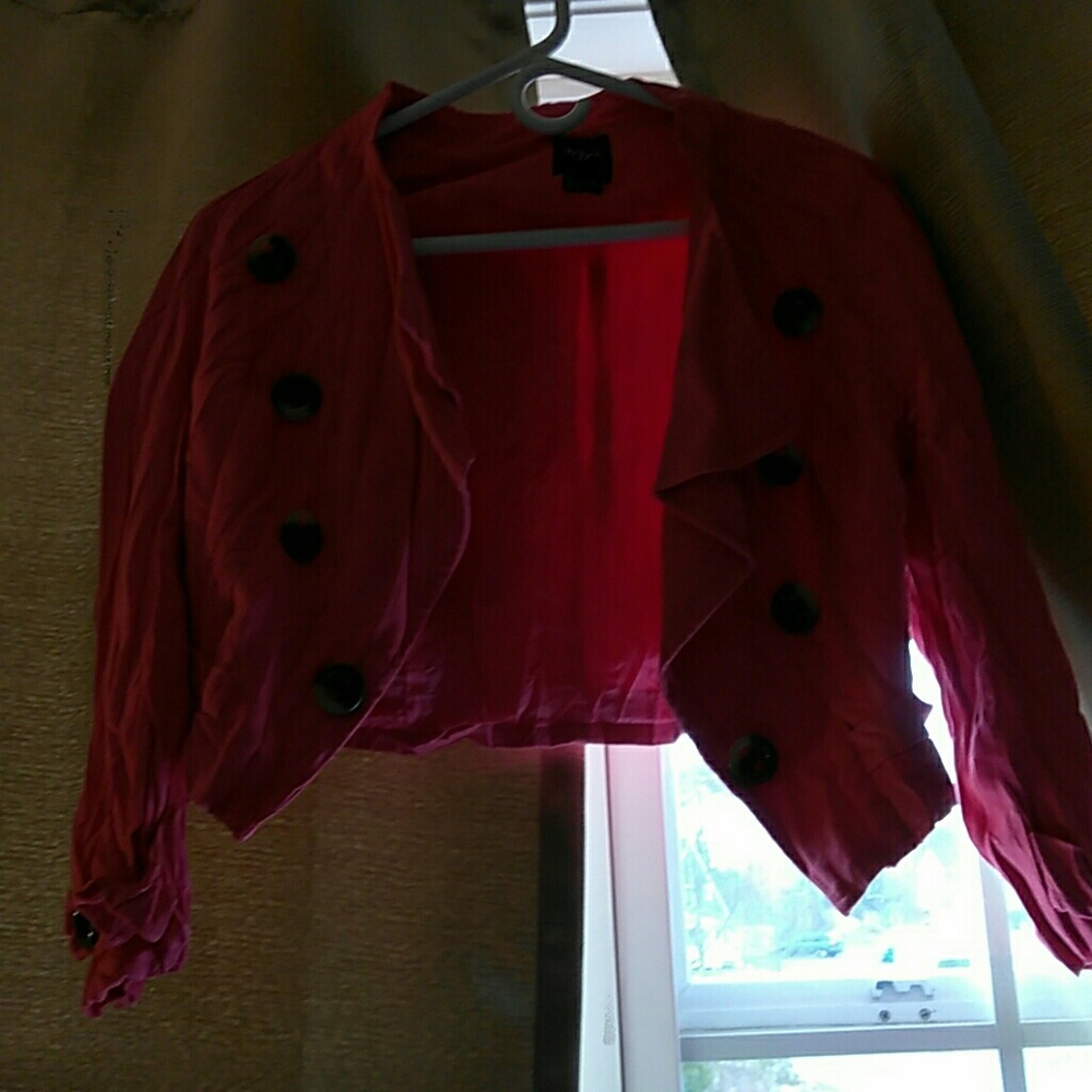 This is an xoxo mid size blazer