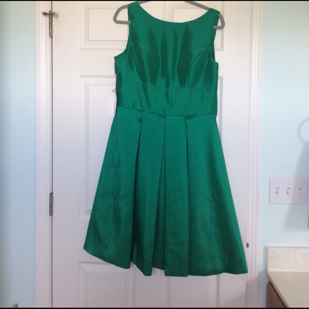 Knee length green silk dress