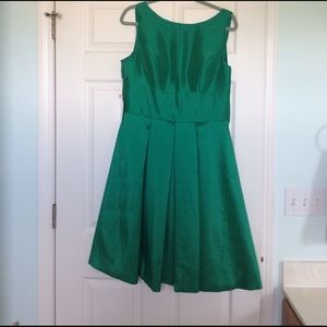 Knee length green silk dress