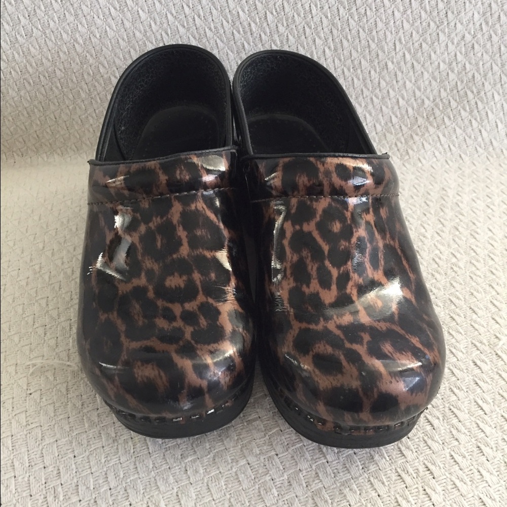 Dansko patten leather leopard clogs