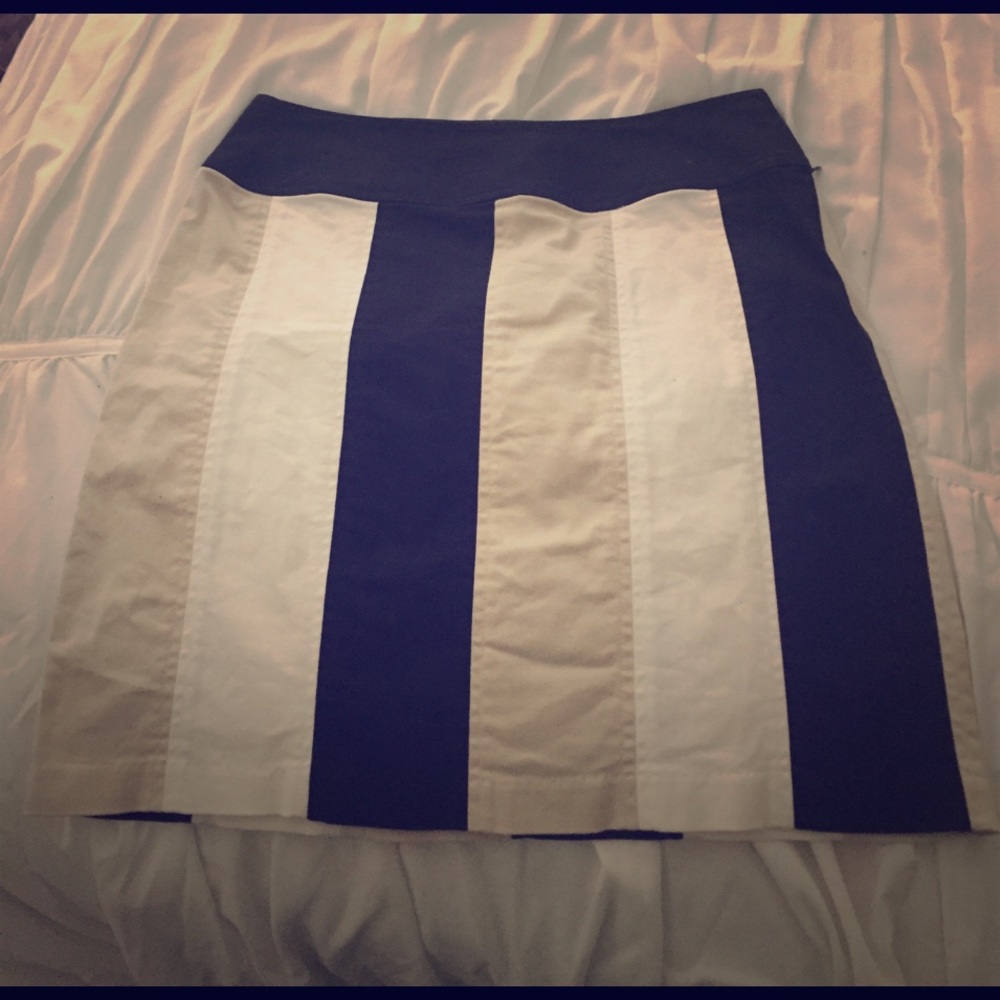 A multi colored pencil skirt, size 2, used.