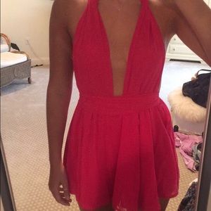 Hot pink wrap romper.