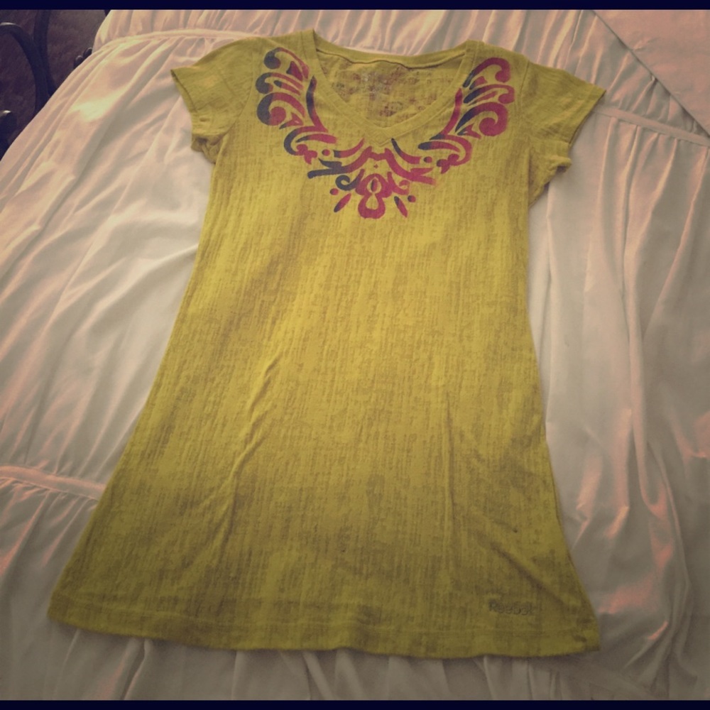 A Reebok top, size S, lemon lime colored w/ design