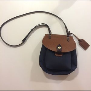 Navy Dooney and Bourke cross body messenger bag