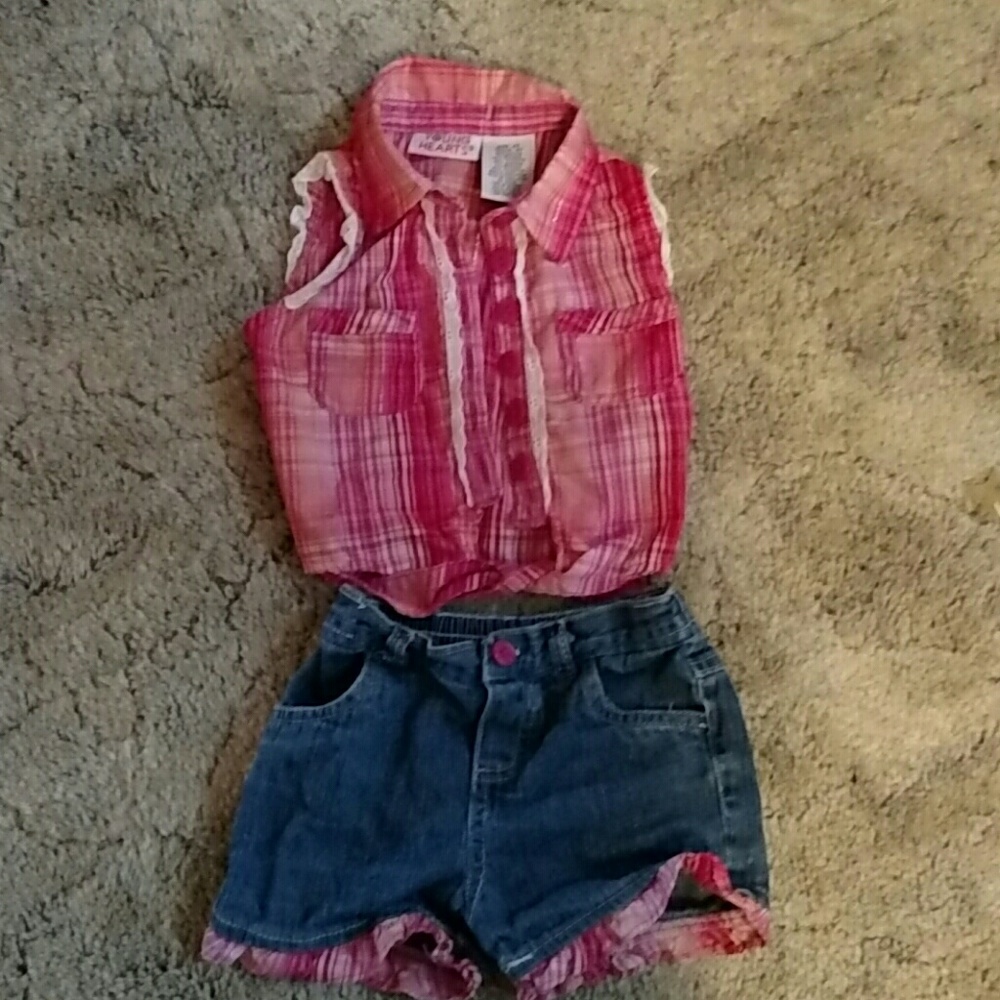 Adorable little girl plaid shirt and shorts
