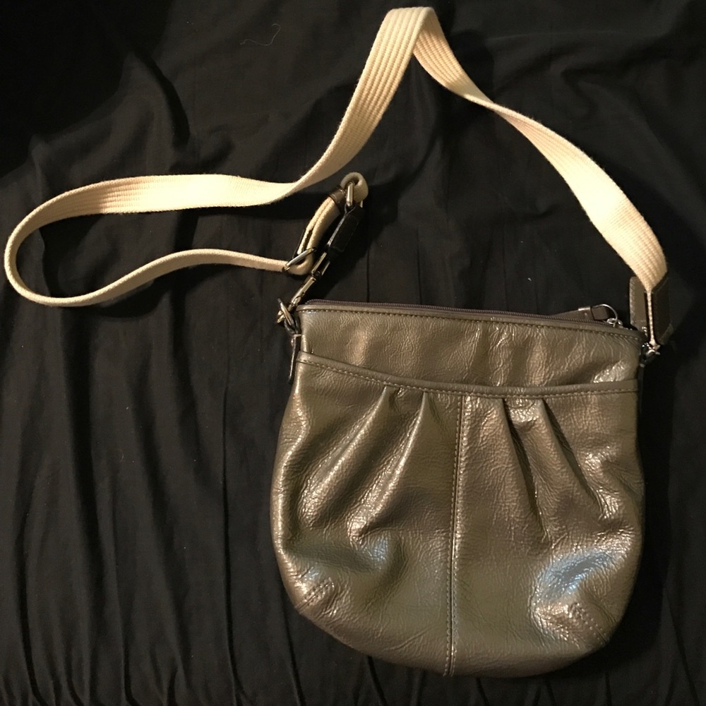 Gray coach purse.