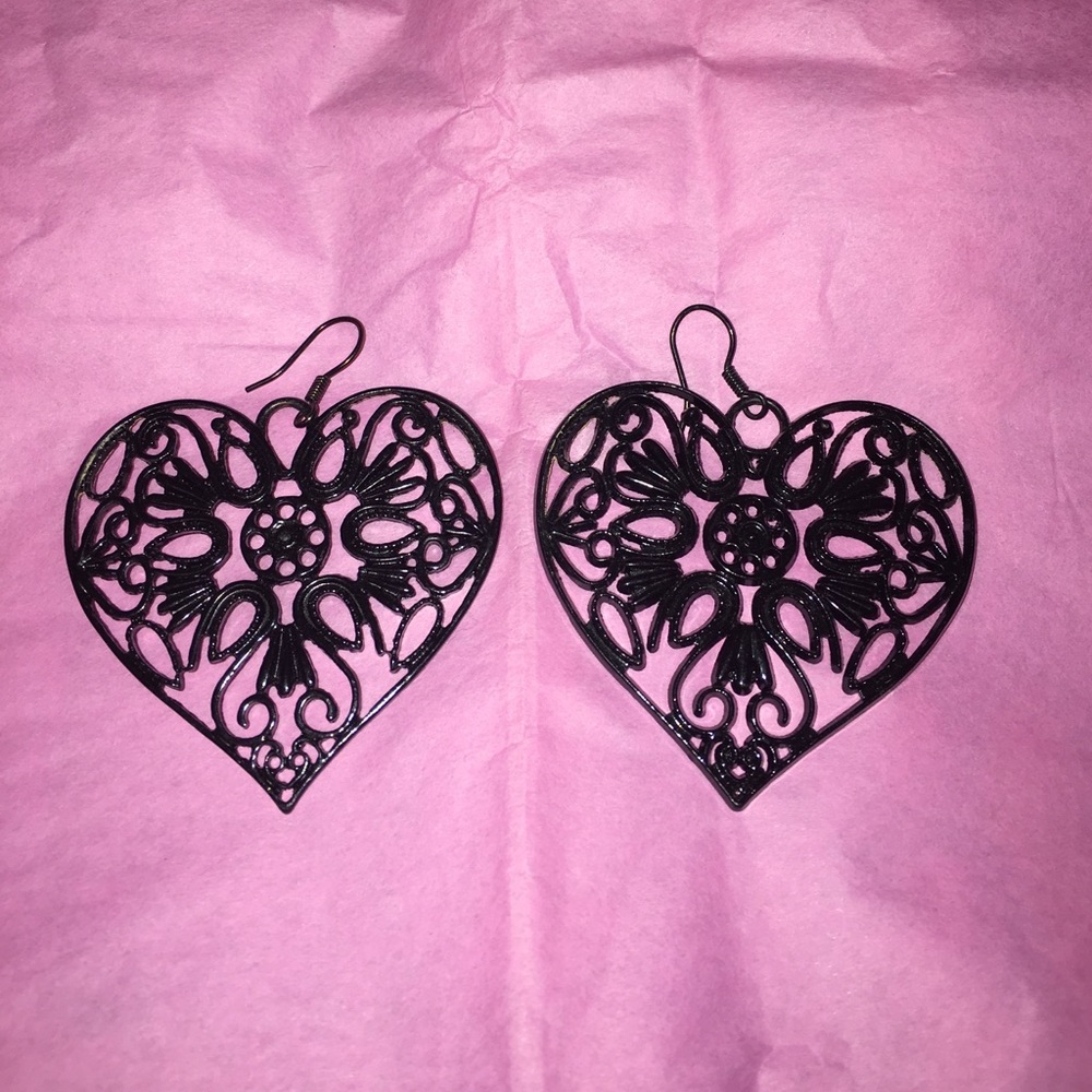 Heart-shaped cutout earrings.