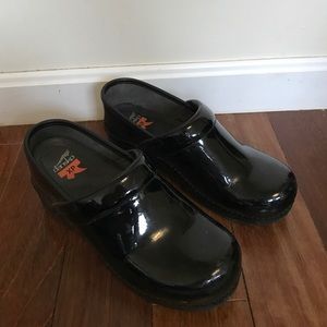 Dansko-black and glossy clogs