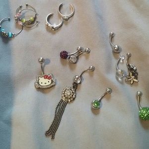 Various unused belly button rings