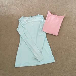 Two workout tops. Worn condition with a few spots