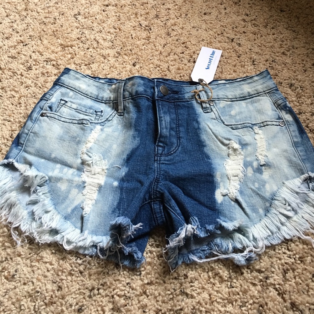 Medium distressed denim shorts