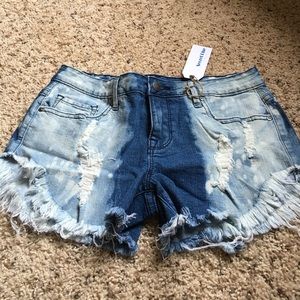 Medium distressed denim shorts