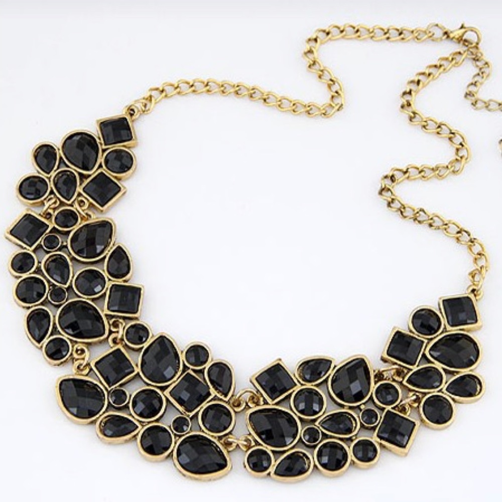 Black statement necklace with gold accents