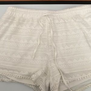 White lace cut off shorts