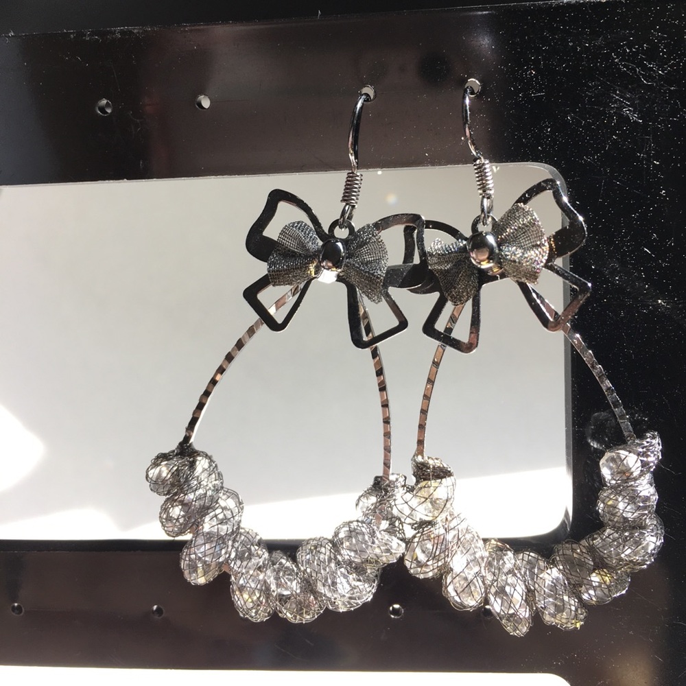 Gunmetal bow and crystal earrings