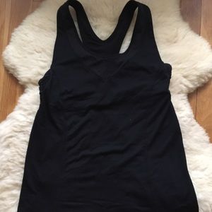 Lululemon black tank with peekaboo back. Size 6.