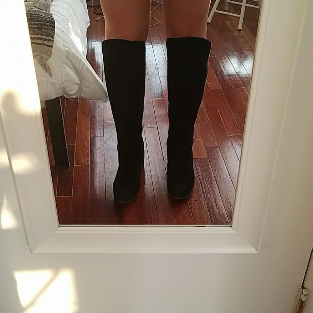 Black leather knee high boots