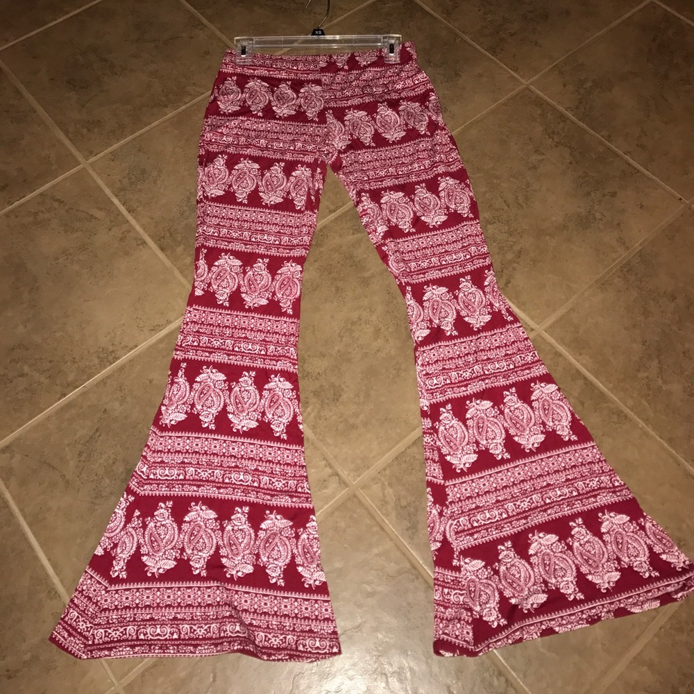 Soft flare white and burgundy pants.