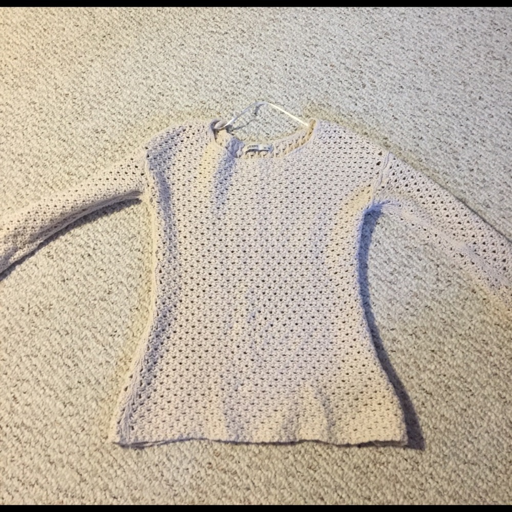 Cream colored, mesh like sweater