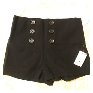 High waist black shorts.