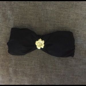 Cute black bandeau top w/gold flower!
