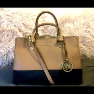 Tan and black Michael Kors purse