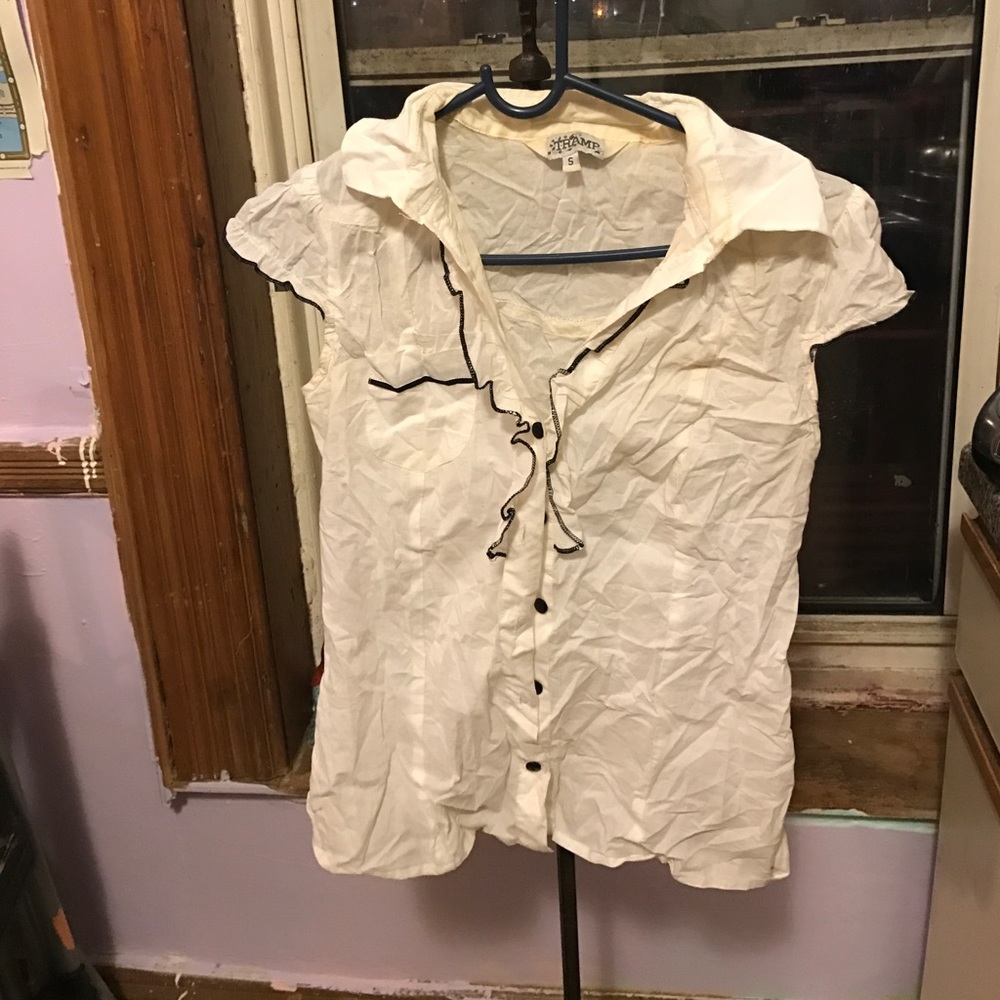 Need iron but cute ruffle white blouse w/ accent
