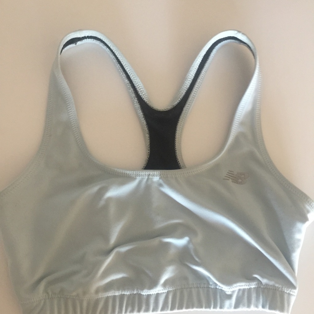 New Balance sports bra in baby blue, size XS