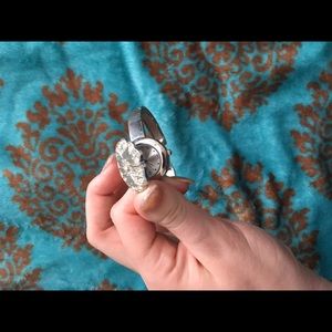 I'm selling a flower covered watch.