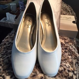 Ladies white leather pumps