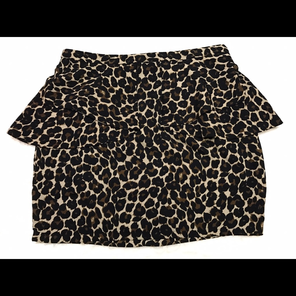 Leopard print peplum mini skirt. Size L