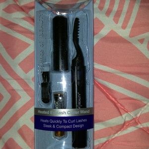 Essence of beauty heated eyelash curler