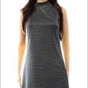 Cute silver and black knee length cocktail dress.