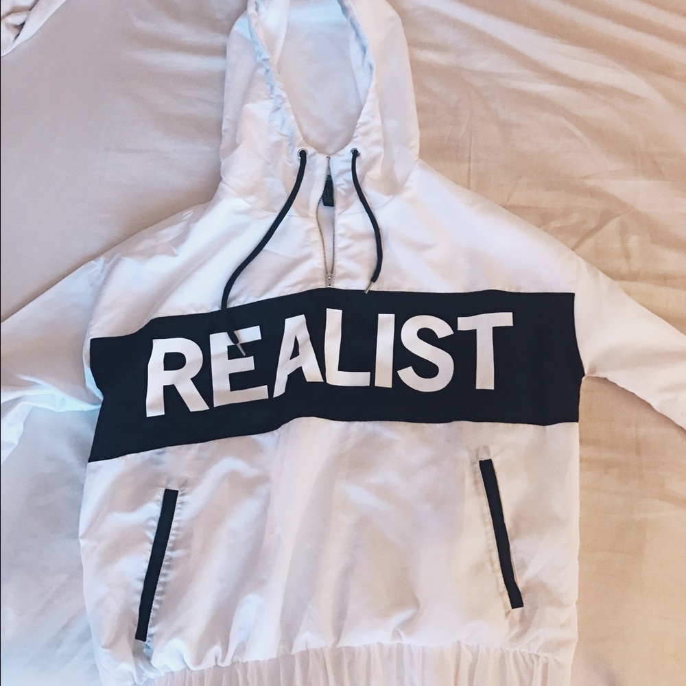 Original White 'REALIST" windbreaker. Worn once.