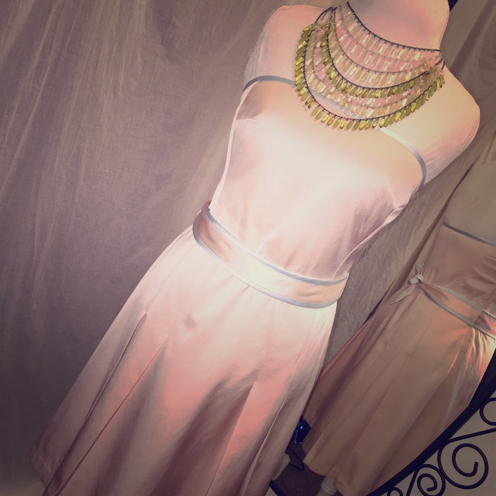 Tocca strapless dress with tie sash.