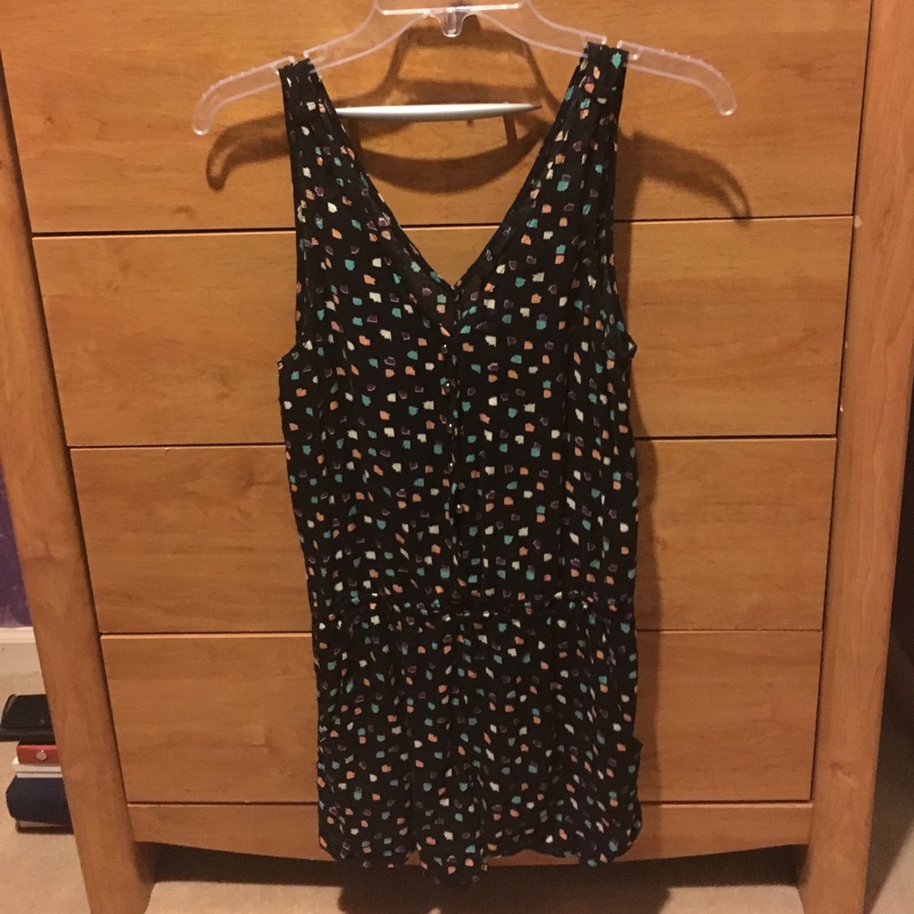 Geometric print black romper.
