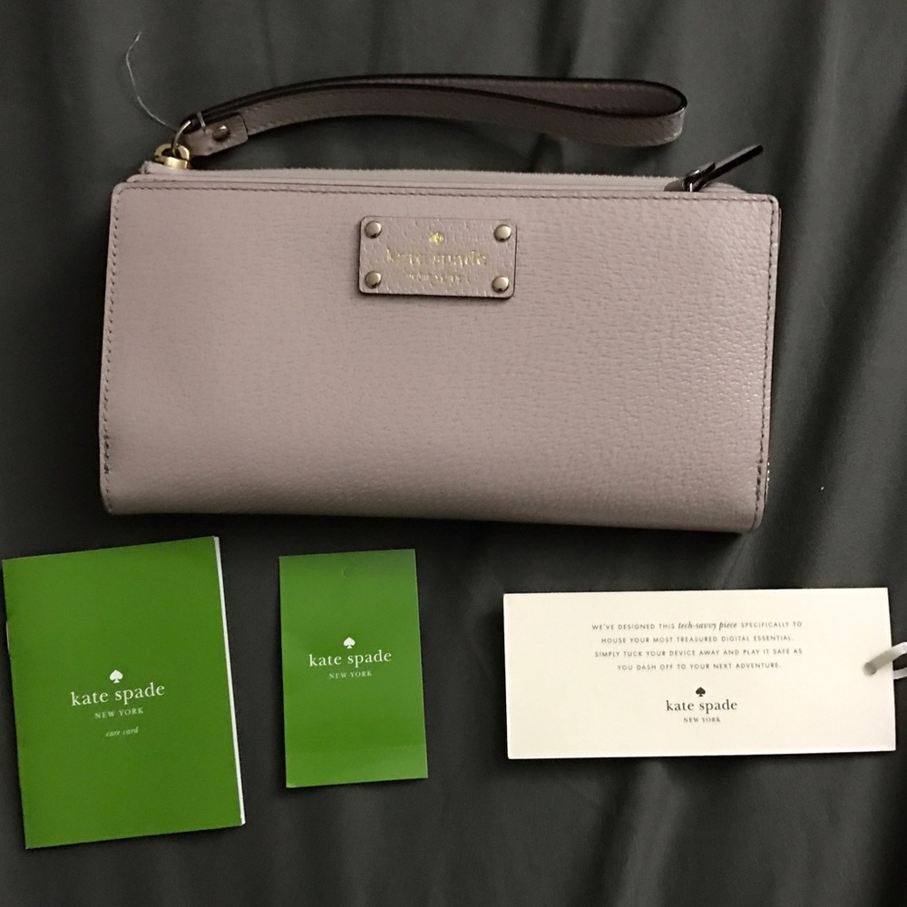 KATE SPADE WRISTLET WALLET. large.