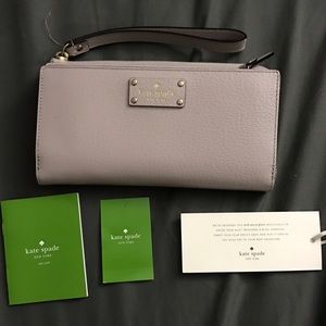 KATE SPADE WRISTLET WALLET. large.