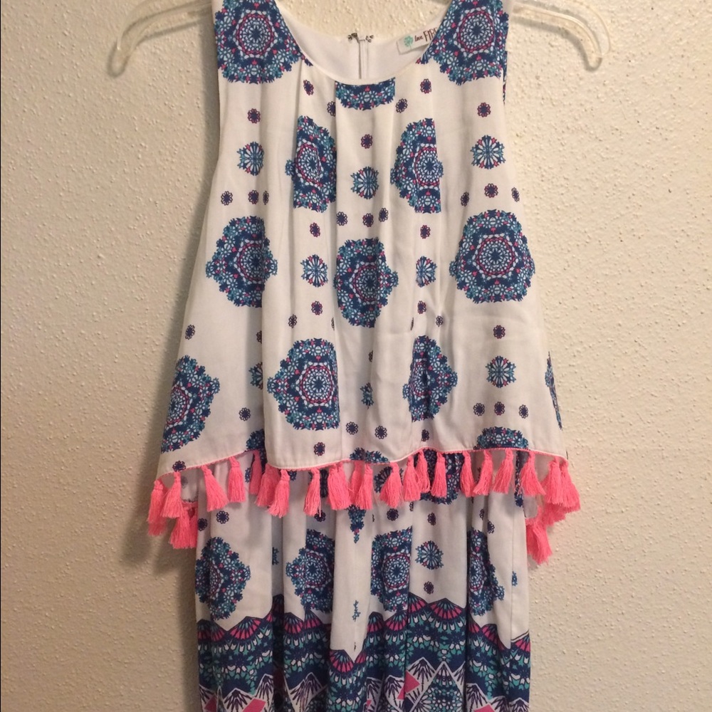 Vibrant pop over tassel trimmed romper