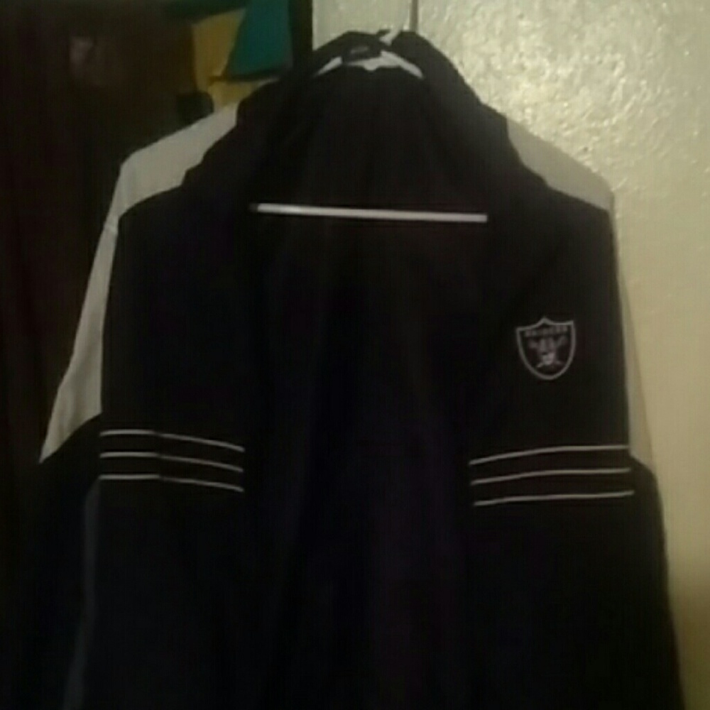 Im selling a Large Reebok Raiders fan windbreaker.